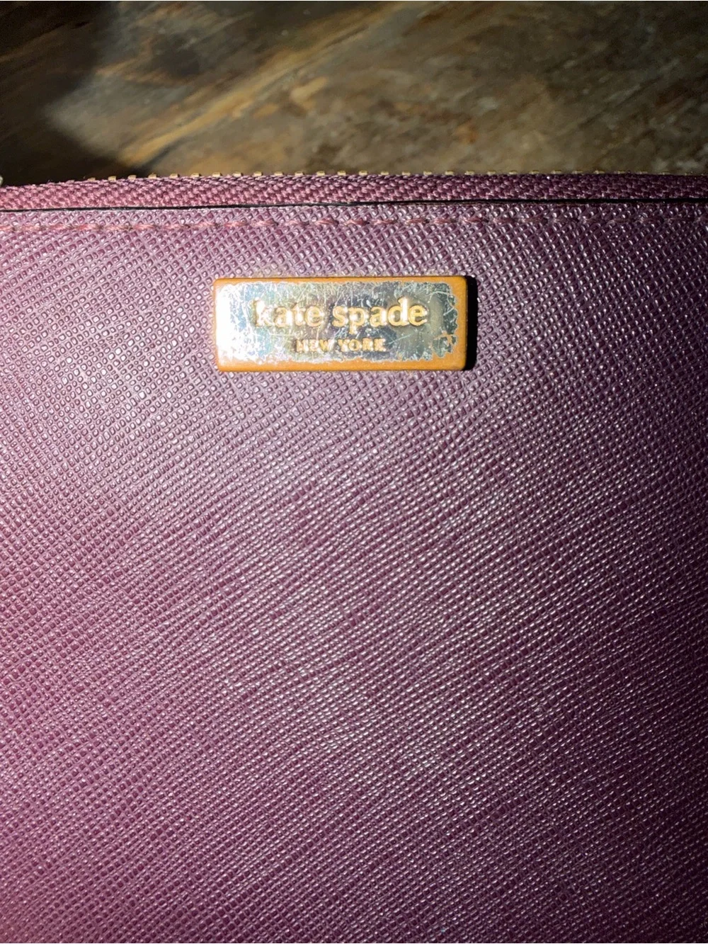 kate spade plum saffiano zip wallet with wristlet